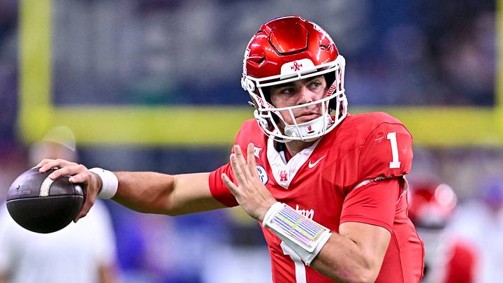 Dec 27, 2025; Houston, TX, USA; Houston Cougars quarterback Conner Weigman (1) warms up prior to the game against the Louisiana State Tigers at NRG Stadium. Mandatory Credit: Maria Lysaker-Imagn Images