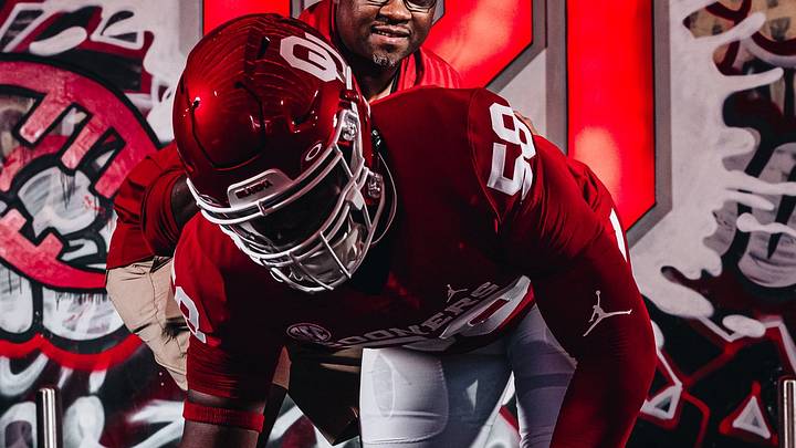 Oklahoma defensive lineman James Carrington, defensive tackles coach Todd Bates Oklahoma defensive lineman James Carrington, defensive tackles coach Todd Bates