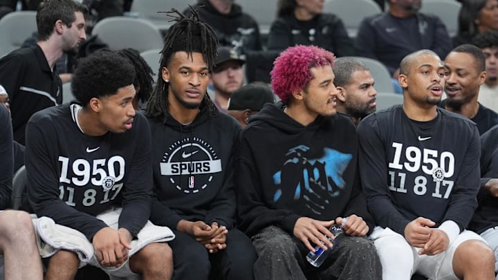 Feb 1, 2026; San Antonio, Texas, USA; San Antonio Spurs forward Jeremy Sochan (10) on the bench between guard Stephon Castle (5) and forward Keldon Johnson (3) in the second half against the Orlando Magic at Frost Bank Center. Mandatory Credit: Daniel Dunn-Imagn Images Feb 1, 2026; San Antonio, Texas, USA; San Antonio Spurs forward Jeremy Sochan (10) on the bench between guard Stephon Castle (5) and forward Keldon Johnson (3) in the second half against the Orlando Magic at Frost Bank Center. Mandatory Credit: Daniel Dunn-Imagn Images