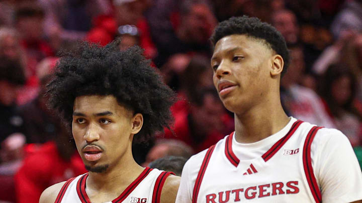 Mar 9, 2025; Piscataway, New Jersey, USA; Rutgers Scarlet Knights guard Dylan Harper (2) and Rutgers Scarlet Knights guard Ace Bailey (4) during a time out during the second half against the Minnesota Golden Gophers at Jersey Mike's Arena. Mandatory Credit: Vincent Carchietta-Imagn Images