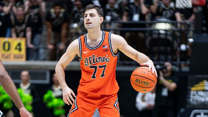 Jan 24, 2026; West Lafayette, Indiana, USA; Illinois Fighting Illini guard Mihailo Petrovic (77) looks for an open teammate during the first half against the Purdue Boilermakers at Mackey Arena. Mandatory Credit: Jacob Musselman-Imagn Images Jan 24, 2026; West Lafayette, Indiana, USA; Illinois Fighting Illini guard Mihailo Petrovic (77) looks for an open teammate during the first half against the Purdue Boilermakers at Mackey Arena. Mandatory Credit: Jacob Musselman-Imagn Images