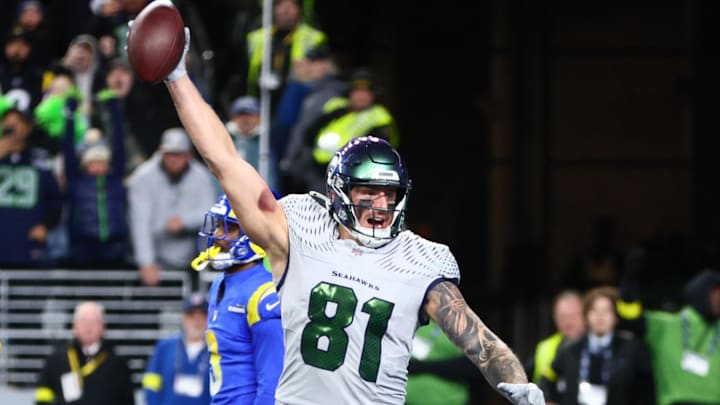 Dec 18, 2025; Seattle, Washington, USA; Seattle Seahawks tight end Eric Saubert (81) celebrates after making a catch for a game-winning two-point conversion against the Los Angeles Rams in overtime at Lumen Field. Mandatory Credit: Kevin Ng-Imagn Images