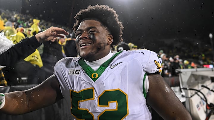 Nov 8, 2025; Iowa City, Iowa, USA; Oregon Ducks defensive lineman A'Mauri Washington (52) reacts with fans after the game against the Iowa Hawkeyes at Kinnick Stadium. Mandatory Credit: Jeffrey Becker-Imagn Images