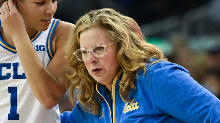 Dec 29, 2024; Los Angeles, California, USA; UCLA Bruins head coach Cori Close talks to UCLA Bruins guard Kiki Rice (1) during the third quarter against the Nebraska Cornhuskers at Pauley Pavilion presented by Wescom. Mandatory Credit: Robert Hanashiro-Imagn Images