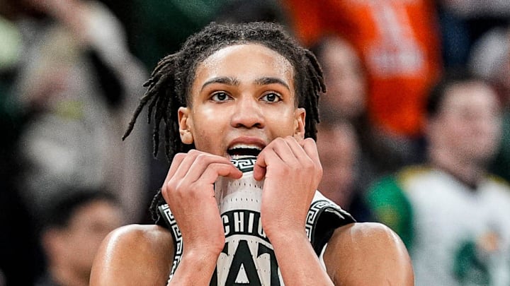Michigan State head coach Tom Izzo talks to forward Jordan Scott (6) after a play against UCLA during the second half of Big Ten tournament quarterfinal at United Center in Chicago on Friday, March 13, 2026.