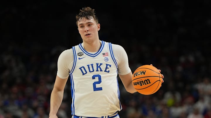 Apr 5, 2025; San Antonio, TX, USA; Duke Blue Devils forward Cooper Flagg (2) dribbles the ball against the Houston Cougars during the second half in the semifinals of the men's Final Four of the 2025 NCAA Tournament at the Alamodome. Mandatory Credit: Bob Donnan-Imagn Images