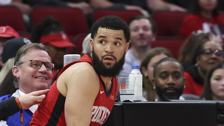 Mar 25, 2025; Houston, Texas, USA; Houston Rockets guard Fred VanVleet (5) reacts after falling into the front row during the fourth quarter of the game against the Atlanta Hawks at Toyota Center. Mandatory Credit: Troy Taormina-Imagn Images