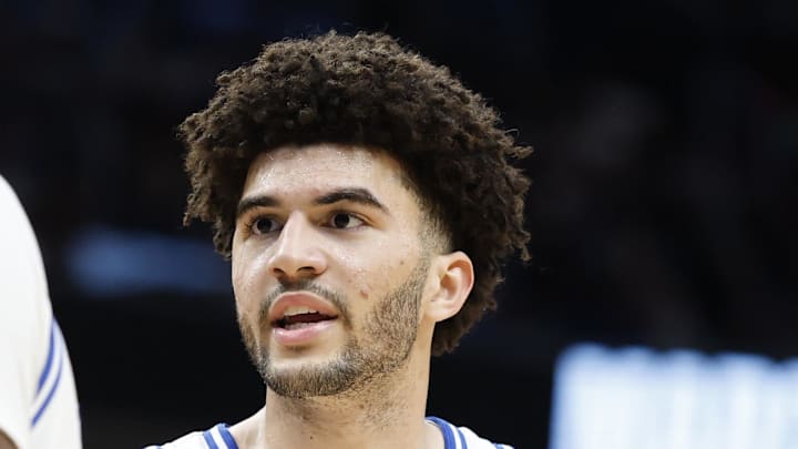 Mar 29, 2026; Washington, DC, USA; Duke Blue Devils forward Cameron Boozer (12) talks to Blue Devils center Patrick Ngongba (21) during a stoppage in play against the UConn Huskies in the second half during an Elite Eight game of the East Regional of the men's 2026 NCAA Tournament at Capital One Arena. Mandatory Credit: Amber Searls-Imagn Images