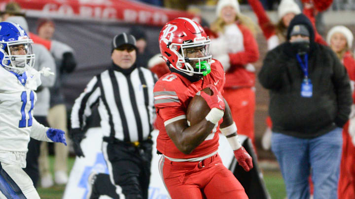 Baylor's David Gabriel Georges (0) runs his way towards the end zone to give Baylor the first points of the game during the TSSAA DII-AAA Football Championships inside Finley Stadium, Chattanooga, Tenn., on Thursday, Dec. 5, 2024.