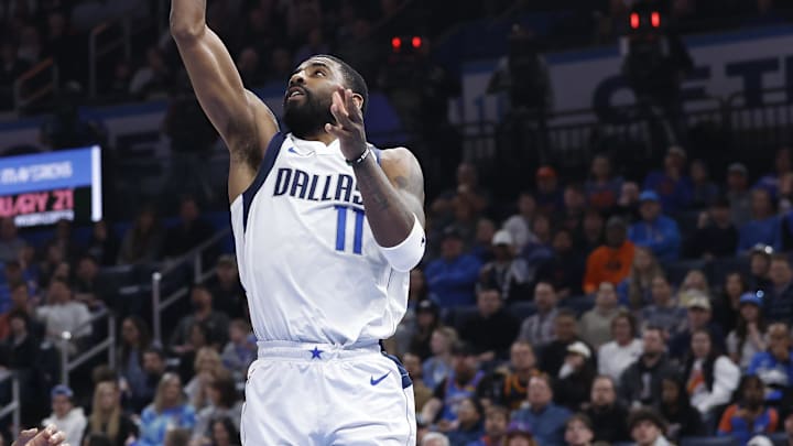 Jan 23, 2025; Oklahoma City, Oklahoma, USA; Dallas Mavericks guard Kyrie Irving (11) shoots against the Oklahoma City Thunder during the second quarter at Paycom Center. Mandatory Credit: Alonzo Adams-Imagn Images