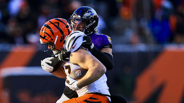 Dec 14, 2025; Cincinnati, Ohio, USA; Cincinnati Bengals tight end Tanner Hudson (87) runs with the ball against Baltimore Ravens safety Alohi Gilman (12) in the second half at Paycor Stadium. Mandatory Credit: Katie Stratman-Imagn Images
Dec 14, 2025; Cincinnati, Ohio, USA; Cincinnati Bengals tight end Tanner Hudson (87) runs with the ball against Baltimore Ravens safety Alohi Gilman (12) in the second half at Paycor Stadium. Mandatory Credit: Katie Stratman-Imagn Images