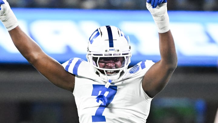 Dec 6, 2025; Charlotte, NC, USA; Duke Blue Devils defensive end Vincent Anthony Jr. (7) reacts after a play in the first quarter against the Virginia Cavaliers during the 2025 ACC Championship game at Bank of America Stadium. Mandatory Credit: Bob Donnan-Imagn Images