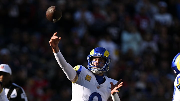 Nov 17, 2024; Foxborough, Massachusetts, USA; Los Angeles Rams quarterback Matthew Stafford (9) throws against the New England Patriots during the first half at Gillette Stadium. Mandatory Credit: Brian Fluharty-Imagn Images