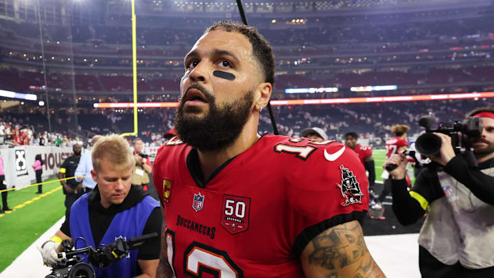 Tampa Bay Buccaneers wide receiver Mike Evans (13) looks on after the game against the Houston Texans Tampa Bay Buccaneers wide receiver Mike Evans (13) looks on after the game against the Houston Texans