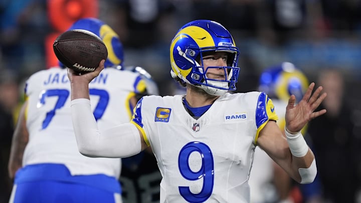 Jan 10, 2026; Charlotte, NC, USA; Los Angeles Rams quarterback Matthew Stafford (9) drops back to pass against the Carolina Panthers in the first half during the NFC Wild Card Round game at Bank of America Stadium. Mandatory Credit: Jim Dedmon-Imagn Images Jan 10, 2026; Charlotte, NC, USA; Los Angeles Rams quarterback Matthew Stafford (9) drops back to pass against the Carolina Panthers in the first half during the NFC Wild Card Round game at Bank of America Stadium. Mandatory Credit: Jim Dedmon-Imagn Images