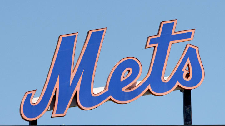 Mar 26, 2022; Port St. Lucie, Florida, USA;  The New York Mets logo stands in center field before the game against the Washington Nationals at Clover Park. Mandatory Credit: Reinhold Matay-Imagn Images