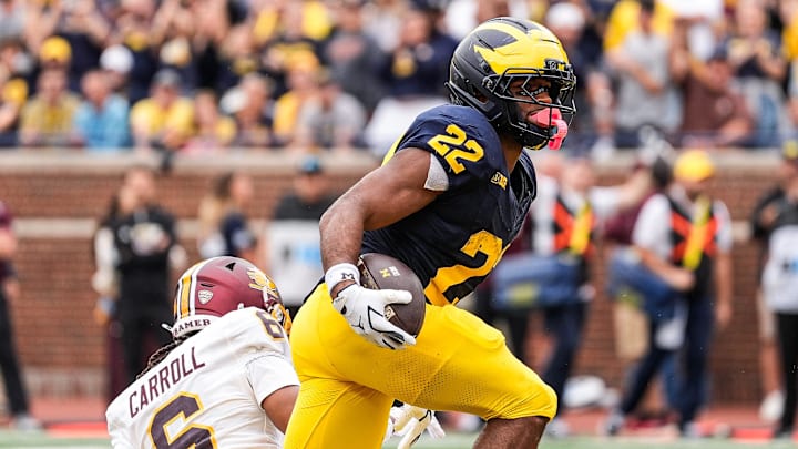 Michigan running back Justice Haynes (22) runs for a touchdown against Central Michigan Michigan running back Justice Haynes (22) runs for a touchdown against Central Michigan
