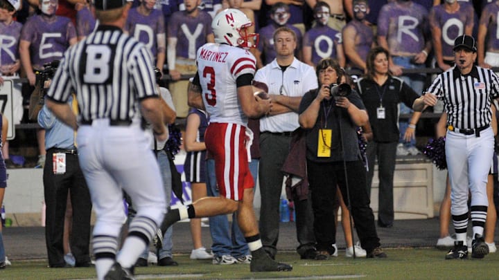 Nebraska quarterback Taylor Martinez runs in for a touchdown during the first half of the Huskers' 2010 game at Kansas State.
