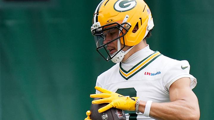 Green Bay Packers receiver Christian Watson (9) runs drills during the first day of a three-day minicamp. Green Bay Packers receiver Christian Watson (9) runs drills during the first day of a three-day minicamp.