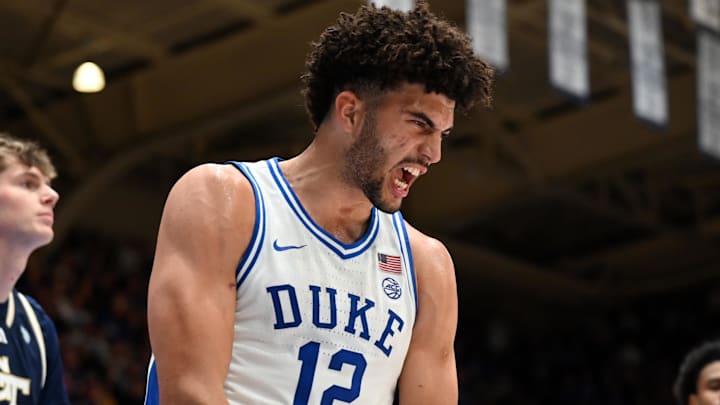 Dec 31, 2025; Durham, North Carolina, USA; Duke Blue Devils forward Cameron Boozer (12) reacts after scoring during the second half against the Georgia Tech Yellow Jackets at Cameron Indoor Stadium.   The Blue Devils won 85-79. 