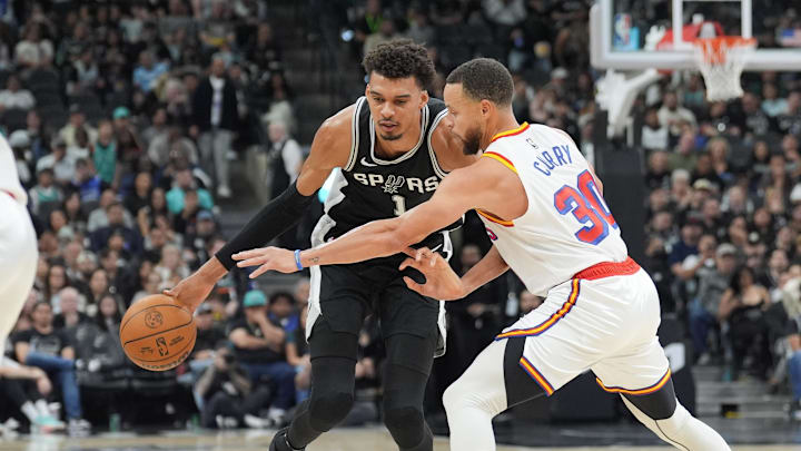 Nov 23, 2024; San Antonio, Texas, USA; San Antonio Spurs center Victor Wembanyama (1) dribbles against Golden State Warriors guard Stephen Curry (30) in the first half at Frost Bank Center. Mandatory Credit: Daniel Dunn-Imagn Images Nov 23, 2024; San Antonio, Texas, USA; San Antonio Spurs center Victor Wembanyama (1) dribbles against Golden State Warriors guard Stephen Curry (30) in the first half at Frost Bank Center. Mandatory Credit: Daniel Dunn-Imagn Images