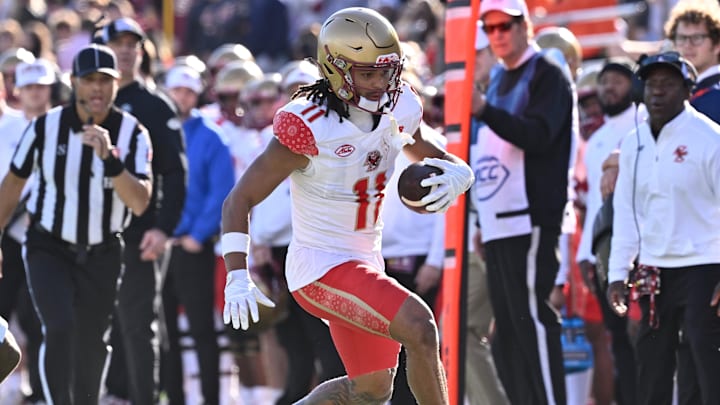 Nov 8, 2025; Chestnut Hill, Massachusetts, USA; Boston College Eagles wide receiver Lewis Bond (11) runs the ball during the first half against the Southern Methodist University Mustangs at Alumni Stadium. Mandatory Credit: Eric Canha-Imagn Images