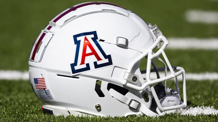 Nov 25, 2022; Tucson, Arizona, USA; Detailed view of an Arizona Wildcats helmet on the field during the Territorial Cup at Arizona Stadium. Mandatory Credit: Mark J. Rebilas-Imagn Images