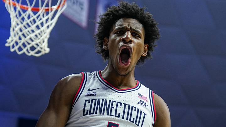 Feb 7, 2025; Storrs, Connecticut, USA; UConn Huskies center Tarris Reed Jr. (5) reacts after his basket against the St. John's Red Storm in the first half at Harry A. Gampel Pavilion. Mandatory Credit: David Butler II-Imagn Images