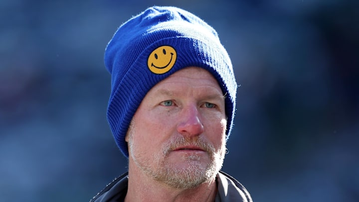 Dec 22, 2024; East Rutherford, New Jersey, USA; Los Angeles Rams general manager Les Snead watches his team warm up before a game against the New York Jets at MetLife Stadium. Mandatory Credit: Brad Penner-Imagn Images Dec 22, 2024; East Rutherford, New Jersey, USA; Los Angeles Rams general manager Les Snead watches his team warm up before a game against the New York Jets at MetLife Stadium. Mandatory Credit: Brad Penner-Imagn Images