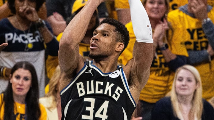 Apr 29, 2025; Indianapolis, Indiana, USA; Milwaukee Bucks forward Giannis Antetokounmpo (34) shoots the ball while  Indiana Pacers forward Pascal Siakam (43) defends during game five of the first round for the 2024 NBA Playoffs at Gainbridge Fieldhouse. Mandatory Credit: Trevor Ruszkowski-Imagn Images