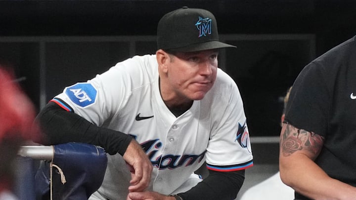 May 21, 2025; Miami, Florida, USA; Miami Marlins manager Clayton McCullough (86) looks on from the dugout during the fourth inning against the Chicago Cubs at loanDepot Park. Mandatory Credit: Jim Rassol-Imagn Images May 21, 2025; Miami, Florida, USA; Miami Marlins manager Clayton McCullough (86) looks on from the dugout during the fourth inning against the Chicago Cubs at loanDepot Park. Mandatory Credit: Jim Rassol-Imagn Images