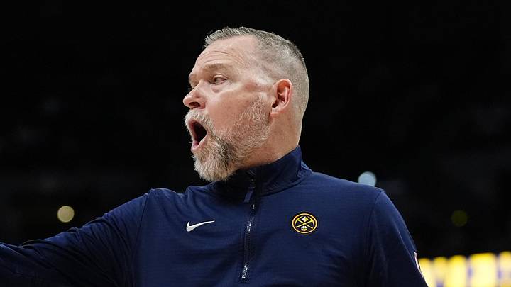 Apr 6, 2025; Denver, Colorado, USA; Denver Nuggets head coach Michael Malone reacts in the second half against the Indiana Pacers at Ball Arena. Mandatory Credit: Ron Chenoy-Imagn Images