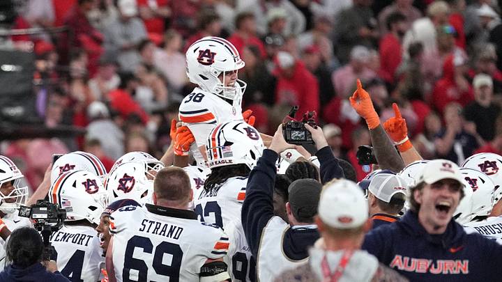 Oct 17, 2026; Athens, Georgia, USA;  Auburn celebrates following a game-winning field goal by Auburn kicker Alex McPherson (38) during the fourth quarter against Georgia at Sanford Stadium.  Mandatory Credit: Dale Zanine-Imagn Images