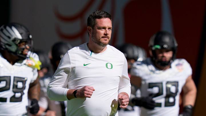 Oregon head coach Dan Lanning takes the field with his team for warmups as the Oregon Ducks take on the Texas Tech Red Raiders in the Orange Bowl on Jan. 1, 2026, at Hard Rock Stadium in Miami, Florida. Oregon head coach Dan Lanning takes the field with his team for warmups as the Oregon Ducks take on the Texas Tech Red Raiders in the Orange Bowl on Jan. 1, 2026, at Hard Rock Stadium in Miami, Florida.