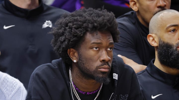 Mar 17, 2026; Minneapolis, Minnesota, USA; Phoenix Suns guard Jalen Green (4) and center Mark Williams (15) watch as their team plays the Minnesota Timberwolves in the fourth quarter at Target Center. Mandatory Credit: Bruce Kluckhohn-Imagn Images