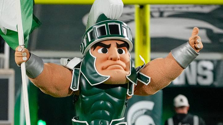 Oct 25, 2025; East Lansing, Michigan, USA; Sparty leads the Michigan State Spartans onto the field prior at a game against the Michigan Wolverines at Spartan Stadium. Mandatory Credit: Brendan Mullin-Imagn Images Oct 25, 2025; East Lansing, Michigan, USA; Sparty leads the Michigan State Spartans onto the field prior at a game against the Michigan Wolverines at Spartan Stadium. Mandatory Credit: Brendan Mullin-Imagn Images