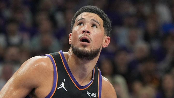 Phoenix, Arizona, USA; Phoenix Suns guard Devin Booker (1) blocks out against the Oklahoma City Thunder in the first half during game three of the first round of the 2026 NBA Playoffs at Mortgage Matchup Center on Apr 25, 2026.
