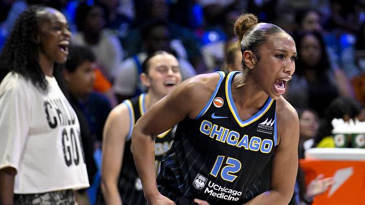 Jun 20, 2026; Arlington, Texas, USA; Chicago Sky guard Sydney Taylor (12) celebrates with her team during the second half against the Dallas Wings at College Park Center. Mandatory Credit: Jerome Miron-Imagn Images