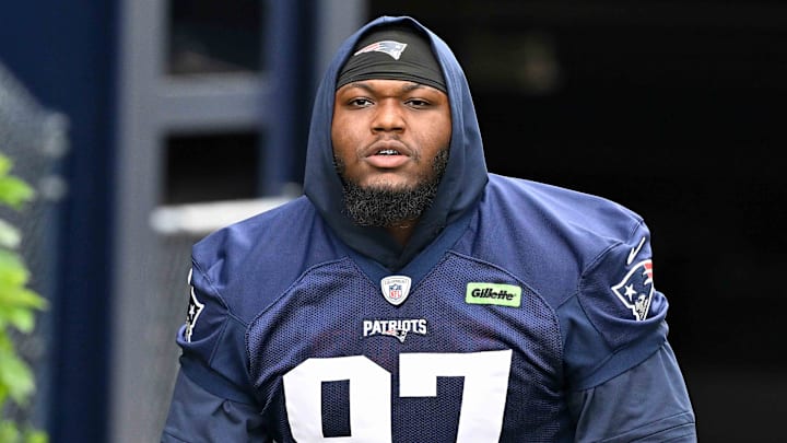 Jun 9, 2025; Foxborough, MA, USA; New England Patriots defensive end Milton Williams (97) walks to the practice fields at Gillette Stadium. Mandatory Credit: Eric Canha-Imagn Images