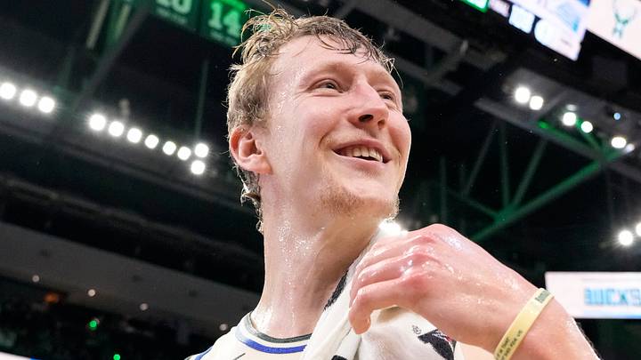 Milwaukee Bucks guard AJ Green (20) reacts after being doused with water following the game against the Brooklyn Nets at Fiserv Forum on Apr 10, 2026.