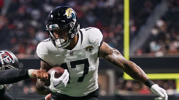 Aug 23, 2024; Atlanta, Georgia, USA; Jacksonville Jaguars tight end Evan Engram (17) is pushed out of bounds by Atlanta Falcons linebacker Bradlee Anae (47) in the second quarter at Mercedes-Benz Stadium. Mandatory Credit: Brett Davis-Imagn Images