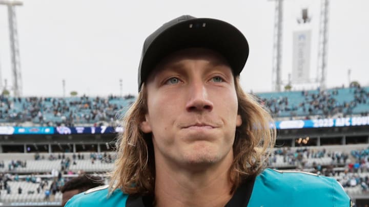 Jan 4, 2026; Jacksonville, Florida, USA; Jacksonville Jaguars quarterback Trevor Lawrence (16) and Tennessee Titans defensive tackle Jeffery Simmons (98) shake hands after the game at EverBank Stadium. Mandatory Credit: Travis Register-Imagn Images