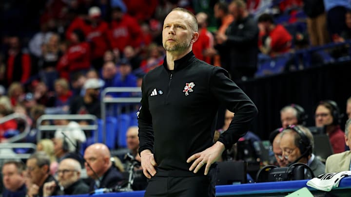 Mar 20, 2025; Lexington, KY, USA; Louisville Cardinals head coach Pat Kelsey looks on during the first half of the game against the Creighton Bluejays in the first round of the NCAA Tournament at Rupp Arena. Mandatory Credit: Jordan Prather-Imagn Images Mar 20, 2025; Lexington, KY, USA; Louisville Cardinals head coach Pat Kelsey looks on during the first half of the game against the Creighton Bluejays in the first round of the NCAA Tournament at Rupp Arena. Mandatory Credit: Jordan Prather-Imagn Images
