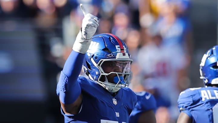 Sep 28, 2025; East Rutherford, New Jersey, USA; New York Giants linebacker Abdul Carter (51) reacts after a play during the fourth quarter against the Los Angeles Chargers at MetLife Stadium.  
