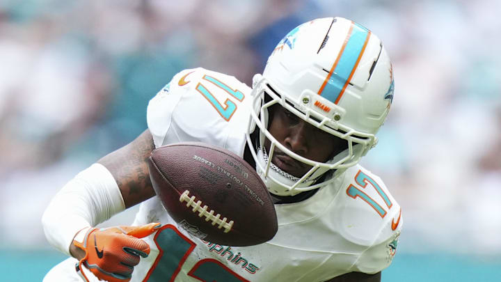 Oct 12, 2025; Miami Gardens, Florida, USA; Miami Dolphins wide receiver Jaylen Waddle (17) catches a pass against the Los Angeles Chargers during the second quarter at Hard Rock Stadium. Mandatory Credit: Rich Storry-Imagn Images