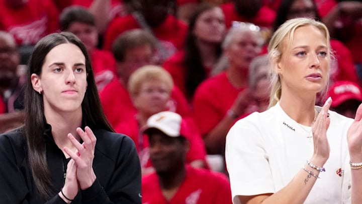 Indiana Fever forward Chloe Bibby (55), guard Caitlin Clark (22) and guard Sophie Cunningham (8) cheer during Game 4 of the WNBA semifinals on Sunday, Sept. 28, 2025, at Gainbridge Fieldhouse in Indianapolis. The Fever defeated the Aces 90-83.