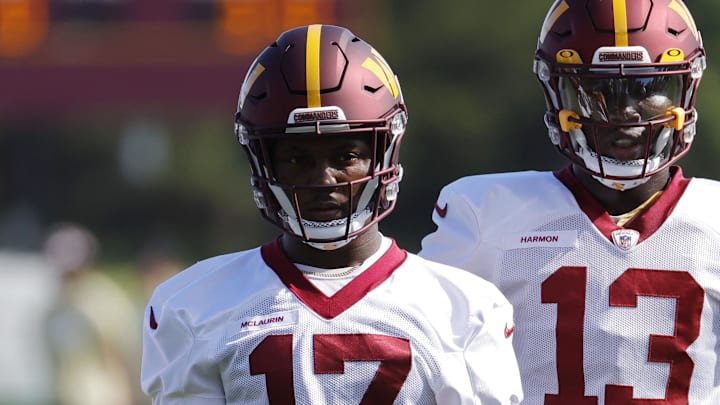 Jul 30, 2022; Ashburn, VA, USA; Washington Commanders wide receiver Terry McLaurin (17) stands with Commanders wide receiver Kyric McGowan (83) and Commanders wide receiver Kelvin Harmon (13) during day four of training camp at The Park in Ashburn. Mandatory Credit: Geoff Burke-Imagn Images