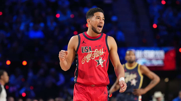 Feb 15, 2026; Inglewood, California, USA; Team USA Stars guard Devin Booker (1) of the Phoenix Suns reacts in game four against Team Stripes during the 75th NBA All Star Game at Intuit Dome. Mandatory Credit: Kirby Lee-Imagn Images