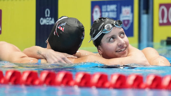 Alex Walsh hugs Kate Douglass after competing in the 200-meter individual medley final, Saturday, June 22, 2024, during the eighth day of the U.S. Olympic Team Swimming Trials at Lucas Oil Stadium in Indianapolis.