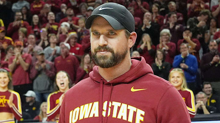 Iowa State football coach Jimmy Rogers speaks during a timeout in the first half in the Iowa State and Iowa men’s basketball Cy-Hawk series at Hilton coliseum on Dec. 11, 2025, in Ames, Iowa.
